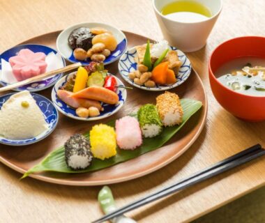 Assorted small dishes with rice balls, miso soup and green tea at Hanaingen, Gunma