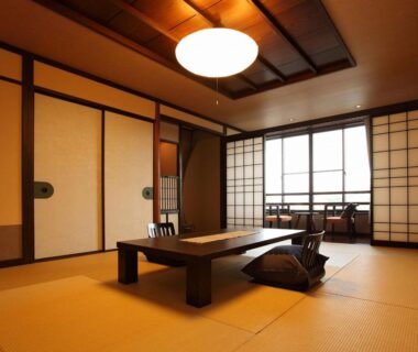 Traditional tatami room with low table, zabuton cushions and shoji screens at Hanano Koyado Jyu-bei, Mie, Kansai