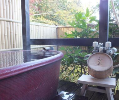 Wooden soaking tub and wash stool on veranda at Hananoyado Fukuya in Kanagawa Kantō Japan