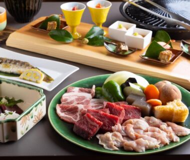 Raw meats and vegetables arranged for tabletop grill at Hanare no Yado Hanagokoro, Kumamoto, Kyūshū
