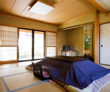 Traditional tatami room with kotatsu and shoji screens at Hanaya Tokubei in Nara