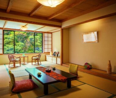 Traditional tatami room with low table and garden view at Harataki, Fukushima, Tōhoku