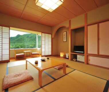 Tatami room with low table and shoji screens at Harunako Onsen Yusuge, Gunma mountains