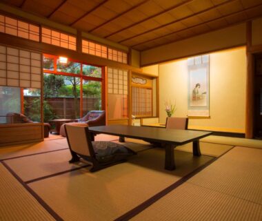 Interior view of tatami room with low table, shoji screens and garden at Hashinoya Bekkan Ransui, Hyōgo