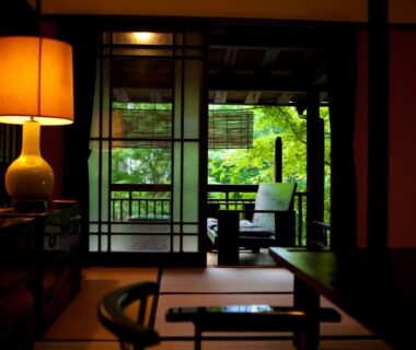Traditional tatami room with shoji and veranda at Hatago Kayausagi in Ōita, Kyūshū