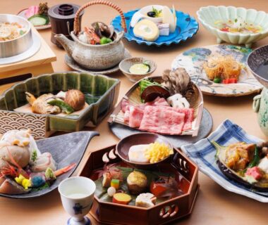 Assorted Japanese ryokan dishes arranged on table at Hatori in Chūbu, Ishikawa
