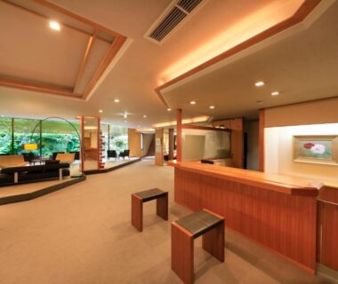 Wood and carpet reception desk with seating and garden view at Hayamakan, Yamagata, Tōhoku, Japan