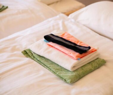 Folded guest robes neatly placed on futon bedding at Healthy Pal Akagi, Gunma, Kantō, Japan