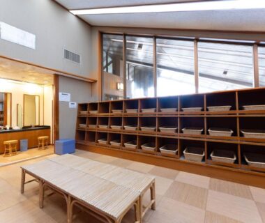 Wooden cubby lockers and benches in Healthy Pal Akagi changing room, Gunma Kanto
