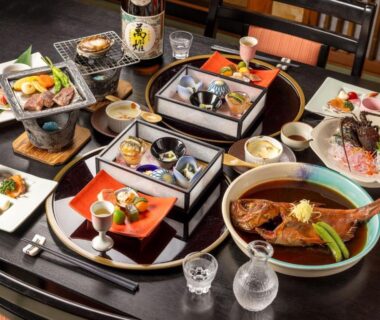 Assorted Japanese dishes on lacquered trays at Hiina ryokan in Shizuoka, Chūbu