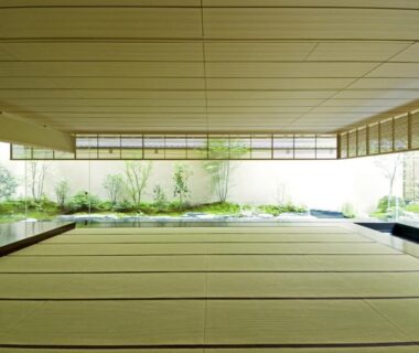 Spacious tatami room with shoji screens and serene garden view at Hiiragiya Kyoto