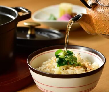 Rice bowl with tea being poured at Hinatamikan ryokan in Gunma Japan