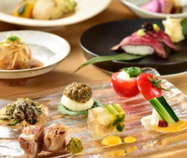 Assorted Japanese appetizer plates on glass tray at Hinatamikan in Gunma Kanto