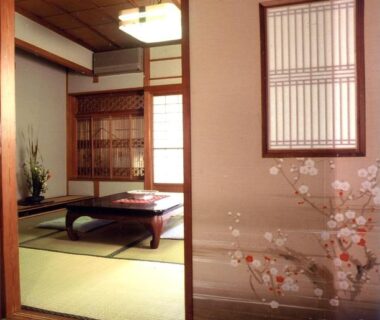 Tatami room with low table and shoji screens at Hinodeya, Shizuoka, Chūbu, Japan