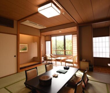 Tatami mats with low table and zaisu chairs at Hiroshima no Yado Aioi in Chūgoku, Hiroshima, Japan