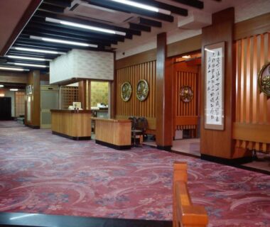Spacious reception corridor with wooden counters, Hitomaru Kadan, Hyōgo, Kansai, Japan