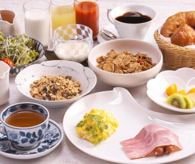 Breakfast spread with croissants, cereal, fruit, coffee and juices at Honjin Hiranoya Kofukan, Gifu