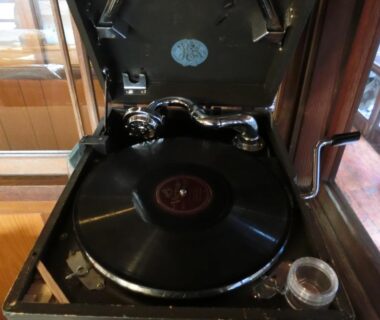 Vintage gramophone with vinyl in a wooden ryokan interior at Hoshidekan in Mie Kansai