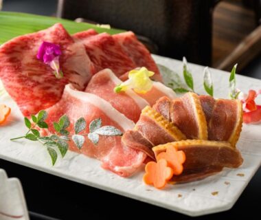 Plated sliced beef with edible flowers and greens at Hotel Asyl Nara, Kansai, Japan