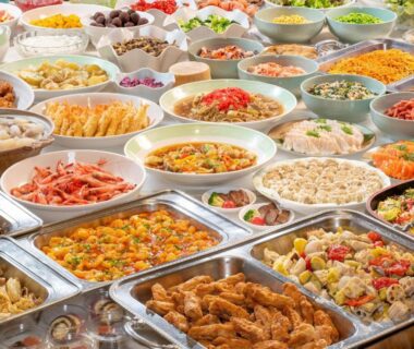 Assorted buffet dishes with tempura, fried seafood, salads and rice in chafing dishes at Hotel Daiheigen, Hokkaidō
