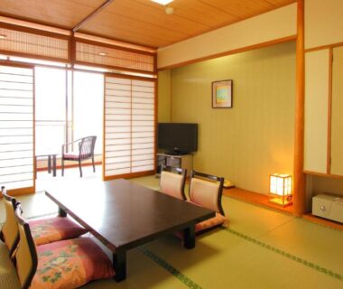 Tatami room with low table, shoji screens and window seating at Hotel Hana Isawa, Yamanashi, Chūbu Japan