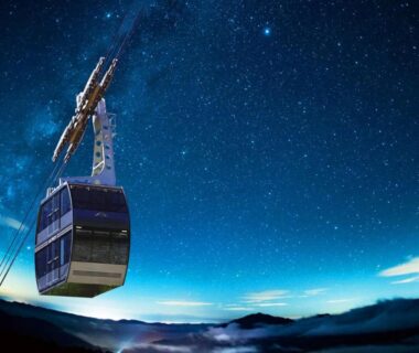 Gondola cable car under starry sky over misty mountains near Hotel Hotaka in Gifu, Chūbu