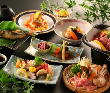 Assorted seasonal Japanese dishes on trays at Hotel Housei in Nagano, Chūbu