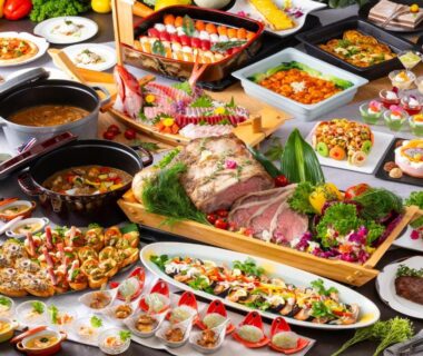 Assorted Japanese buffet dishes arranged on tables at Hotel Ichii in Gunma Kanto