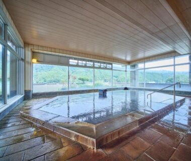 Indoor tiled onsen with panoramic windows at Hotel Kameya, Miyagi, Tohoku, Japan