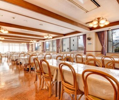 Long dining hall with wooden chairs and large windows, Hotel La Montagne Furuhata, Nagano, Chūbu
