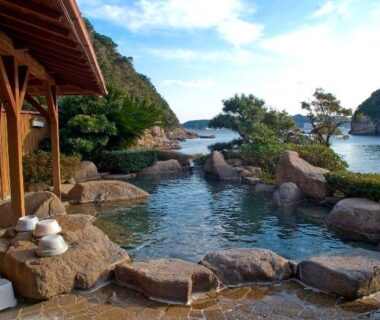 Outdoor rock onsen bath overlooking the sea at Hotel Nagisaya, Wakayama, Kansai, Japan