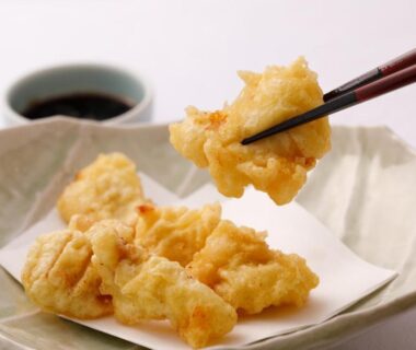 Crispy tempura pieces served with dipping sauce at Hotel New Tsuruta, Ōita, Kyūshū