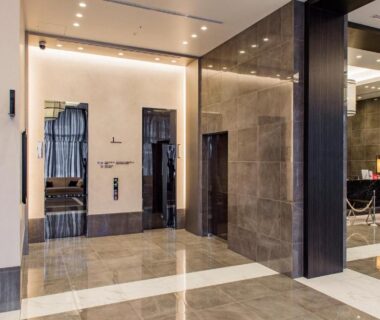 Polished marble lobby with reception desk at Hotel Ole, Shizuoka, Chūbu, Japan