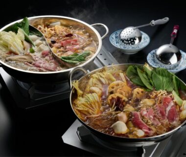 Two nabe hot pots with thinly sliced meat and vegetables served at Hotel ST MORITZ Niigata