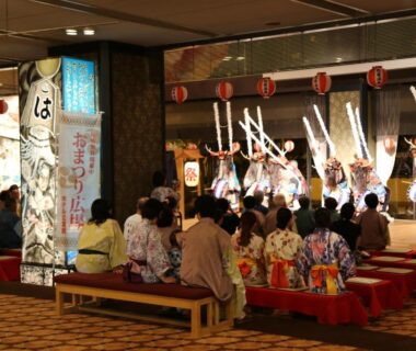 Guests in yukata in banquet hall watching traditional dancers at Hotel Senshukaku, Iwate Tohoku