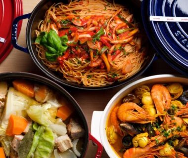 Three enamel pots with seafood, noodles, and vegetables at Hotel Shidotaira in Iwate Tohoku