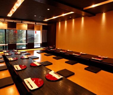 Tatami dining room with low table and cushions at Hotel Shosenkaku Romankan in Kumamoto, Kyushu, Japan