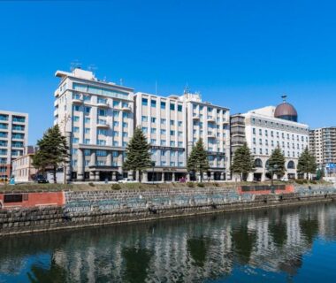 Canal beside Hotel Sonia Otaru in Hokkaidō with riverside promenade and reflective water