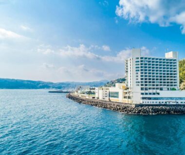 Coastal hotel on rocky shore with expansive sea, Hotel Sun Hatoya, Shizuoka, Chūbu, Japan
