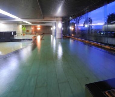 Spacious indoor onsen with panoramic windows at Hotel Taikan, Iwate, Tohoku, Japan