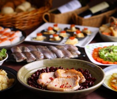 Assorted Japanese dishes arranged on a table at Hotel Takimoto in Nagano, Chūbu