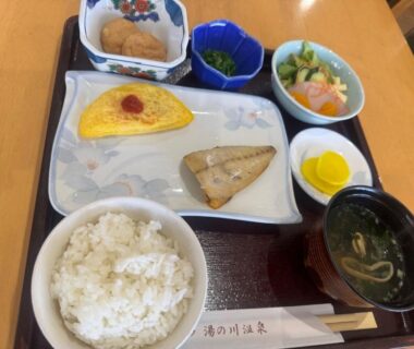 Japanese breakfast tray at Hotel Tetora Yunokawaonsen in Hokkaidō Japan with rice, grilled fish and miso soup