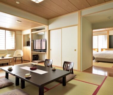 Tatami room with low table and adjoining bedroom, Hotel Tsubakino, Nagano, Chūbu, Japan
