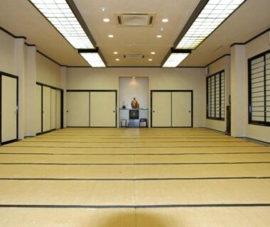 Large tatami hall with shoji screens and tokonoma at Hotel Uguisu, Iwate, Tōhoku