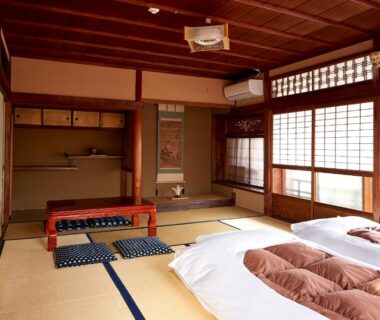 Tatami room with futon bedding, low table and shoji screens at Hotobil B&B 潤, Nara, Kansai Japan