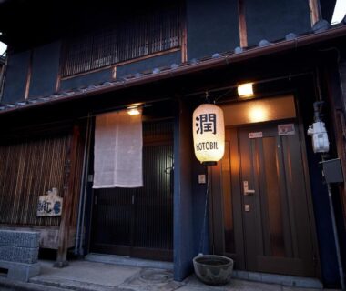 Wooden ryokan facade with paper lantern and noren at entrance, Hotobil B&B in Nara