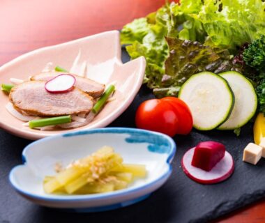 Small side dishes with fresh salad and pickles at Hozanso Beppu, Ōita, Kyūshū