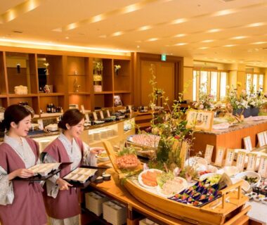 Staff in yukata serving buffet in Hyoe Koyokaku dining hall Hyogo