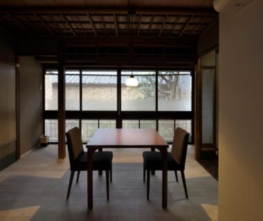 Low table and chairs in tatami room at IZUYASU Traditional Kyoto Inn, Kyoto
