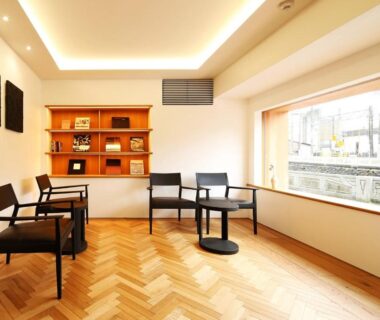 Bright wooden-floored seating area with chairs and window at Ichidaya, Hyōgo, Kansai, Japan